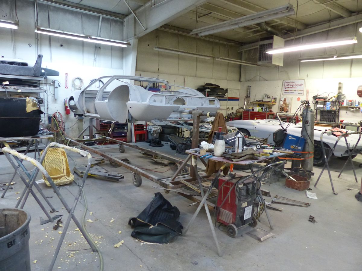 Restoration ground zero, on the right a mid-year Corvette roadster getting the full treatment, and at left is a DeTomaso Mangusta that's been taken down about as far as you can.  It will be perfect when done, I'm sure.