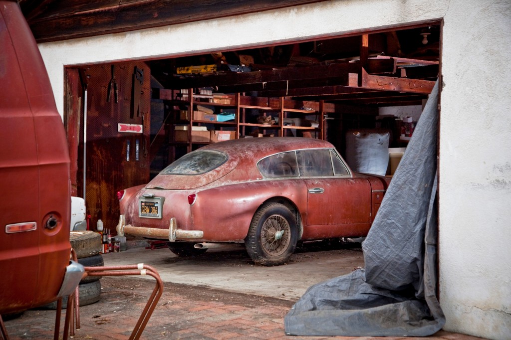 This fabulous Aston Martin sat for decades in a ramshackle garage in Malibu California, and I was there when it was pulled out and taken away to auction