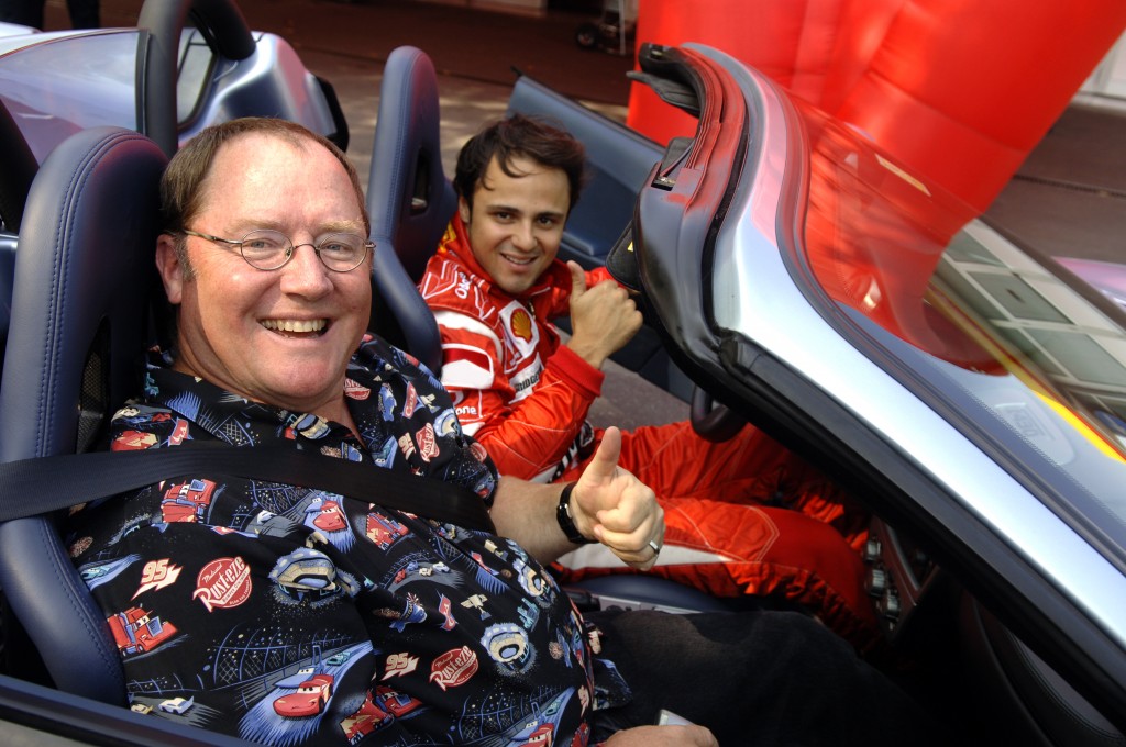 Enthusiastic kids of all ages help the cause; this is Disney/PIXAR's John Lassiter, with Ferrari's Felipe Massa