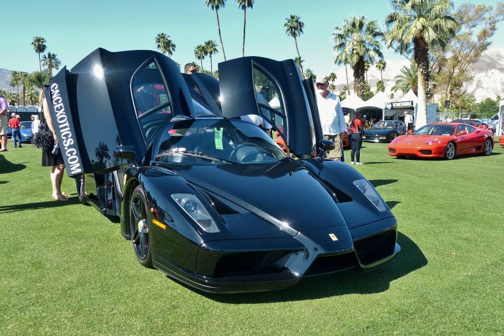 If Darth Vader and Batman had Ferraris, this is what they'd drive; a rare, all black Enzo.  This F1-inspired machine is still one of my favorite Ferraris, for its menacing looks, high technology, naturally aspirated race-derviced V-12 and general exotic badassness
