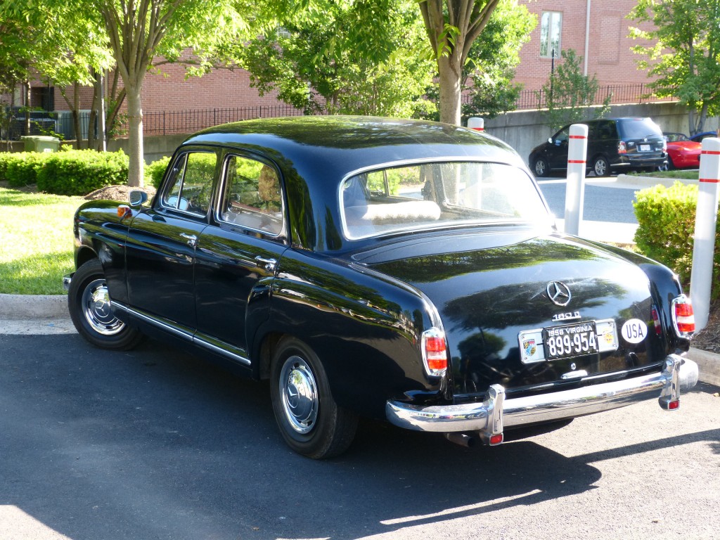 This fabulously original 1959 190D was bought new by its original, now little old lady owner, in 1960.  It is all original, replete with matching fitted luggage set, and the original owner was there to show the car and share her story -- most coolness