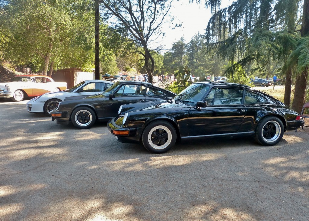 We Porshes got our own little parking alcove with a half dozen nice cars.  That's my own black '89 Carrera coupe, with a most spectacular 25000 mile 911 SC in dark gray, right next to me