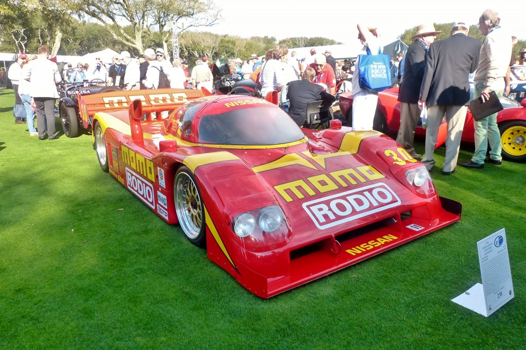 Inspire of the bright red paint and Momo livery, this is NOT an IMSA Ferrari, instead but an ultra fast turbo V-6 Nissan IMSA prototype.  Besides all the heavy classics and sports cars, motorsport is a bit part of Amelia's makeup, and you'll always see great race cars here.