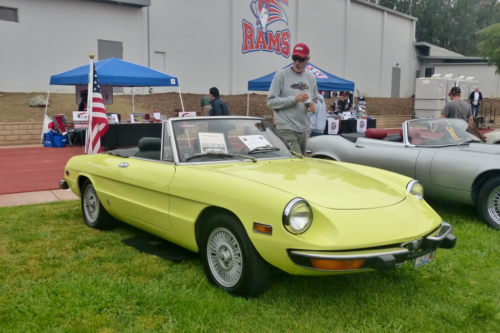 The yellow thing is my friend Jeff's 1974 Alfa Romeo Spyder, and the tall thing standing next to it is my friend Jeff.
