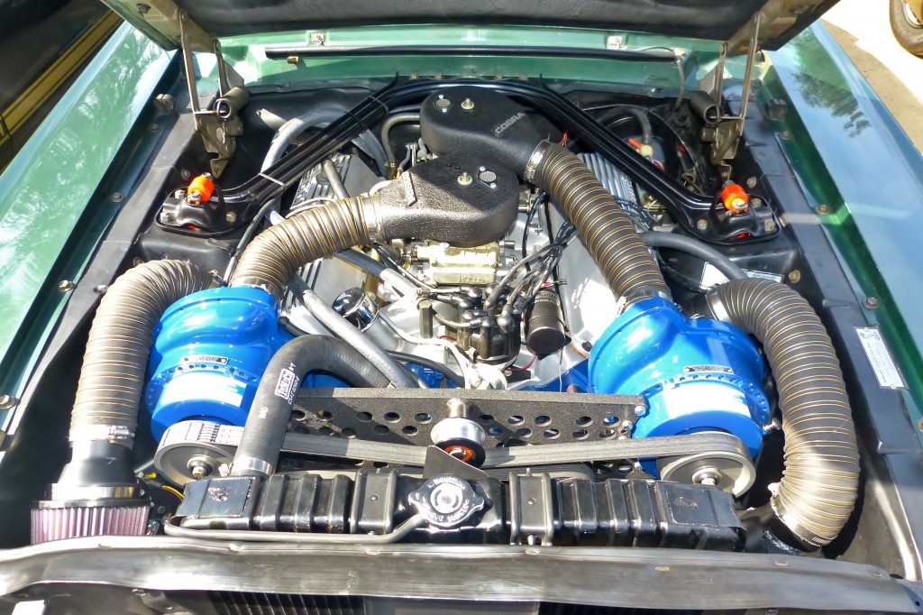 Yes, that's twin Paxton superchargers and dual carbs, so one carb and one blower for every four cylinders...