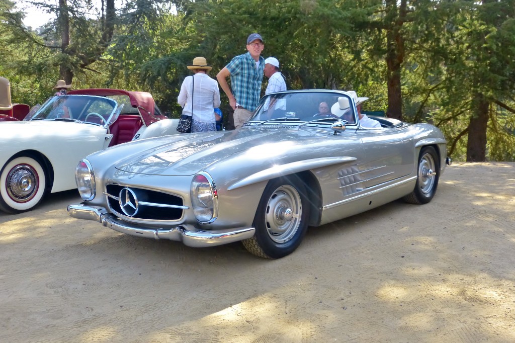 My friend and all around fabulous car guy and enthusiast collector Bruce Meyer drive this mondo tasty 300SL; he's the guy in the monster cowdude hat.