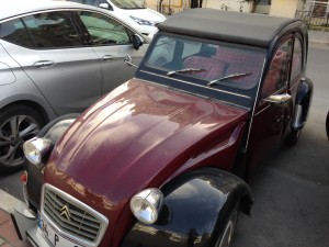 Likely the most charming and most classic car in Izmir Turkey, this two tone 2CV is charming in any land.